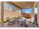 Inviting backyard with a covered patio and comfortable seating, perfect for outdoor relaxation at 106 Rock Crossing Ave, North Las Vegas, NV 89031