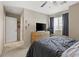 Bright bedroom featuring a ceiling fan, neutral walls, and a window for natural light at 106 Rock Crossing Ave, North Las Vegas, NV 89031