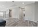 Bonus room with light gray walls, laminate floors, and several doors at 106 Rock Crossing Ave, North Las Vegas, NV 89031