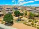 Community playground surrounded by desert landscape and neighborhood homes at 106 Rock Crossing Ave, North Las Vegas, NV 89031