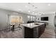 Open floor plan living room boasts a ceiling fan, and lots of natural light at 106 Rock Crossing Ave, North Las Vegas, NV 89031