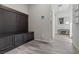 This mudroom has built-in storage and gray walls at 106 Rock Crossing Ave, North Las Vegas, NV 89031