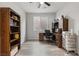 Office with dark wood furnishings and a ceiling fan at 106 Rock Crossing Ave, North Las Vegas, NV 89031