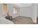 Neutral bedroom featuring gray walls, carpet and a window with brown blinds at 10601 Lessona St, Las Vegas, NV 89141