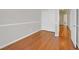 Bedroom featuring gray walls, hardwood floors and closet at 10601 Lessona St, Las Vegas, NV 89141