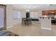 Bright dining area next to the kitchen featuring a modern table and chairs at 10601 Lessona St, Las Vegas, NV 89141