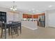 Spacious dining area with views of the kitchen and natural light at 10601 Lessona St, Las Vegas, NV 89141