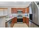 Well-equipped kitchen featuring stainless steel appliances and ample counter space at 10601 Lessona St, Las Vegas, NV 89141