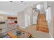 Open-concept living room and kitchen with lots of light at 10601 Lessona St, Las Vegas, NV 89141