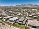 Expansive community view displaying well-maintained homes and picturesque desert mountain scenery at 12295 Skyracer Dr, Las Vegas, NV 89138