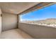 Balcony view of the city, desert landscape, and mountains in the distance at 12295 Skyracer Dr, Las Vegas, NV 89138