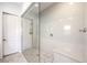 Modern bathroom features a glass-enclosed shower with built-in bench seating at 12295 Skyracer Dr, Las Vegas, NV 89138