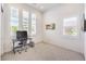 Bright bedroom with shuttered windows and space for a desk or vanity at 12295 Skyracer Dr, Las Vegas, NV 89138