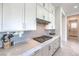 This kitchen features light counter tops and cabinetry, stainless steel appliances and lots of storage at 12295 Skyracer Dr, Las Vegas, NV 89138