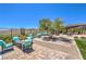 Inviting patio with comfortable seating and a relaxing atmosphere, perfect for outdoor entertaining at 12295 Skyracer Dr, Las Vegas, NV 89138