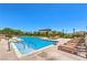 Inviting community pool with comfortable lounge chairs, perfect for relaxation and recreation at 12295 Skyracer Dr, Las Vegas, NV 89138