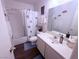 Bathroom with a sink vanity, and a shower curtain featuring fish at 1320 Driscoll Dr # 201, Las Vegas, NV 89128