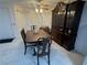 Dining room with a ceiling fan, a vintage hutch, and seating for six at 1320 Driscoll Dr # 201, Las Vegas, NV 89128