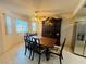Bright dining room with a classic hutch, tile flooring, and comfortable seating at 1320 Driscoll Dr # 201, Las Vegas, NV 89128