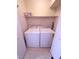 Convenient laundry area equipped with washer, dryer, and shelving for storage solutions at 1320 Driscoll Dr # 201, Las Vegas, NV 89128