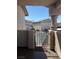 View from the patio, showcasing the building's exterior and parking area at 1320 Driscoll Dr # 201, Las Vegas, NV 89128