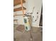 Close-up view of the water heater with shelves and plumbing, perfect for home maintenance and projects at 1400 Silver Peak Ave, Pahrump, NV 89048