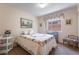 This bedroom is bright with a window and features a bed and decor at 1789 Castro Hill Ave, Henderson, NV 89012