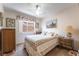 Warm bedroom features a comfortable bed and a view to the exterior at 1789 Castro Hill Ave, Henderson, NV 89012