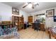 Comfortable bedroom with a ceiling fan, bookcase, desk, and bright window at 1789 Castro Hill Ave, Henderson, NV 89012