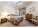 Cozy bedroom featuring a comfortable bed, natural light, and neutral decor at 1789 Castro Hill Ave, Henderson, NV 89012