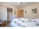 Cozy bedroom with neutral walls, carpeted floor, and ample closet space, creating a warm and inviting retreat at 1789 Castro Hill Ave, Henderson, NV 89012