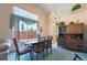 Inviting dining room with natural light and stylish chandelier at 1789 Castro Hill Ave, Henderson, NV 89012