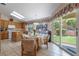 Eat-in kitchen with breakfast nook, bright light, tile floors, and backyard access at 1789 Castro Hill Ave, Henderson, NV 89012