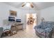 Cozy bonus room with comfortable chair, desk, and connection to the fireplace at 1789 Castro Hill Ave, Henderson, NV 89012