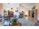 Open concept living room with fireplace and seamless flow to dining and bedrooms at 1789 Castro Hill Ave, Henderson, NV 89012