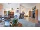 Open concept living room with fireplace and seamless flow to dining and bedrooms at 1789 Castro Hill Ave, Henderson, NV 89012