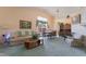 Comfortable living room features vaulted ceiling, stylish furniture and soothing color palette at 1789 Castro Hill Ave, Henderson, NV 89012
