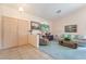 Inviting living room featuring tiled entry, vaulted ceilings and soothing color palette at 1789 Castro Hill Ave, Henderson, NV 89012