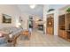 Spacious living room with tile flooring, a cozy fireplace, and abundant natural light at 1789 Castro Hill Ave, Henderson, NV 89012