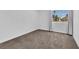 Bedroom with neutral-toned walls, carpeted floors, and a bright window at 1795 Nuevo Rd, Henderson, NV 89014