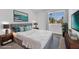 Bedroom featuring a queen bed, a large window, and dark wood night stands at 1795 Nuevo Rd, Henderson, NV 89014