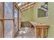 The greenhouse is bright with an open workspace at 1795 Nuevo Rd, Henderson, NV 89014