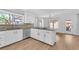 Spacious kitchen with granite countertops, hardwood floors and stainless steel appliances at 1795 Nuevo Rd, Henderson, NV 89014