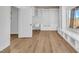 This well-lit room with hardwood flooring offers custom shelving and a cozy window bench for added charm at 1795 Nuevo Rd, Henderson, NV 89014