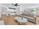 Bright living room features modern design, hardwood floors and abundant natural light at 1795 Nuevo Rd, Henderson, NV 89014
