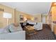 Bedroom featuring a sofa, desk, a king bed and a kitchenette for easy access to snacks and drinks at 2000 N Fashion Show Dr # 4318, Las Vegas, NV 89109