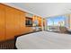 Bright bedroom with a king bed, a kitchenette featuring modern appliances, and a sitting area overlooking the city at 2000 N Fashion Show Dr # 4318, Las Vegas, NV 89109