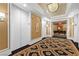 Elegant hallway featuring decorative carpet, detailed walls, and sophisticated lighting fixtures at 2000 N Fashion Show Dr # 4318, Las Vegas, NV 89109