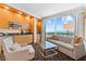 Inviting living area with stylish furniture and a kitchenette, complemented by panoramic city views at 2000 N Fashion Show Dr # 4318, Las Vegas, NV 89109