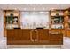 Modern reception area with wooden shelves and a glass counter, creating a professional atmosphere at 2000 N Fashion Show Dr # 4318, Las Vegas, NV 89109